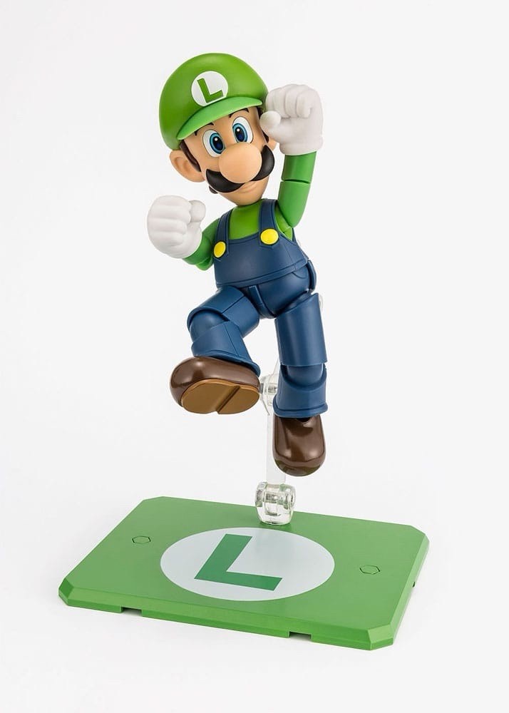 Toysverse TCG Bandai S.H. Figuarts Luigi action figure jumping on a green L-branded display stand